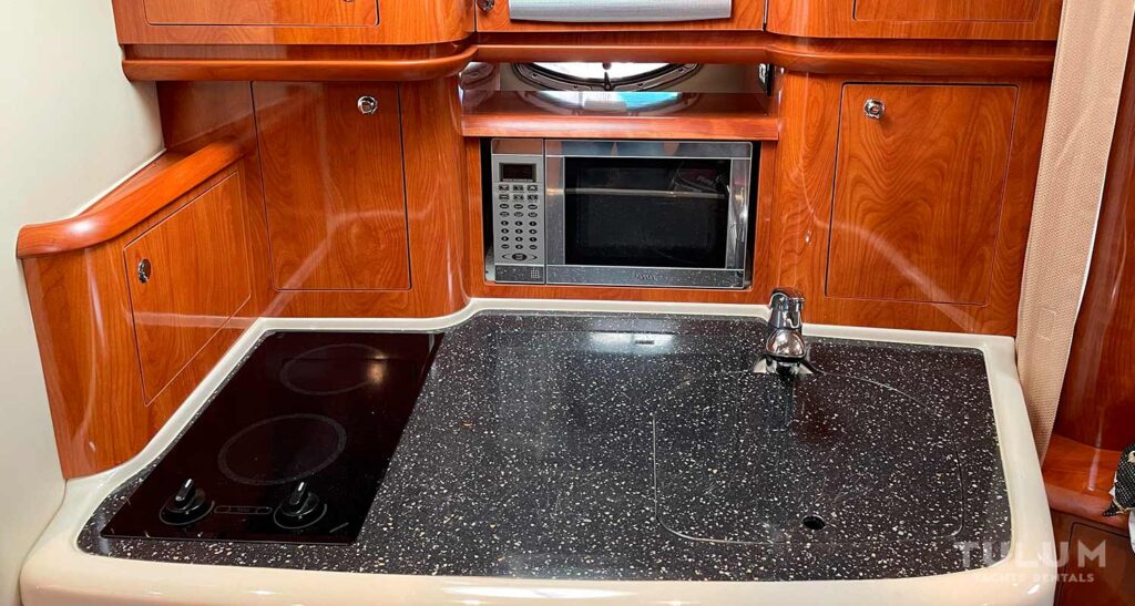 Compact Kitchen on the 37-Ft Four Winns Yacht